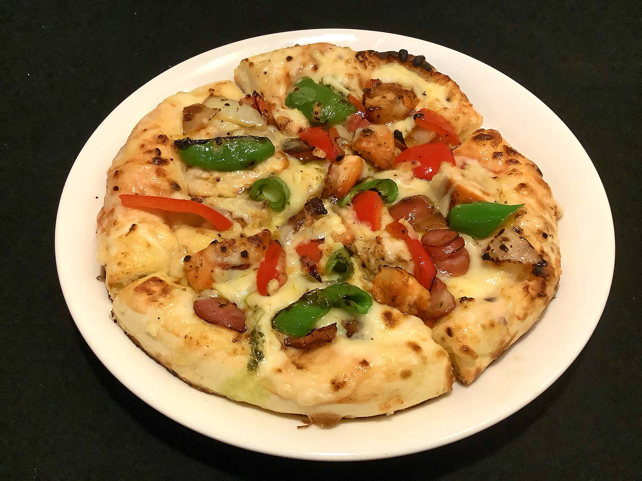 タンドリーチキンのミックスピザ